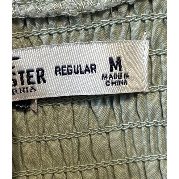 Hollister Light Green Smocked Floral Romper W/ Pockets & Versatile Off-Shoulder - Picture 7 of 9